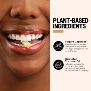 Woman smiling, plant-based capsule in mouth.
