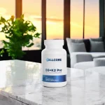 D3+K2 Pro bottle on a marble table in front of a sunset window