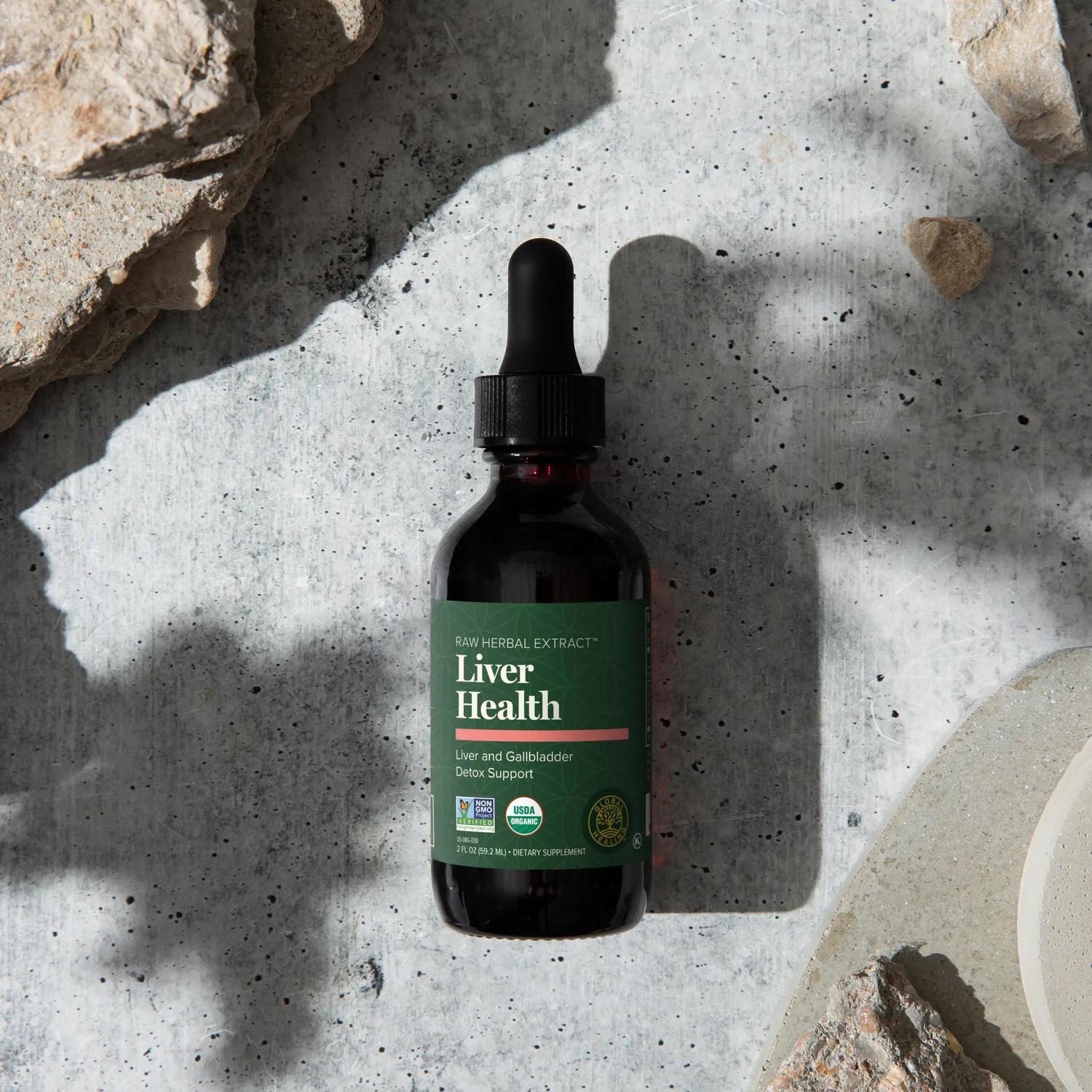 Global Healing Liver Health bottle flat lay on speckled stone