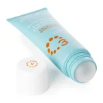 PurO3 Jojoba Oil Deodorant Orange & Bergamot lying down with the roll-on ball uncapped